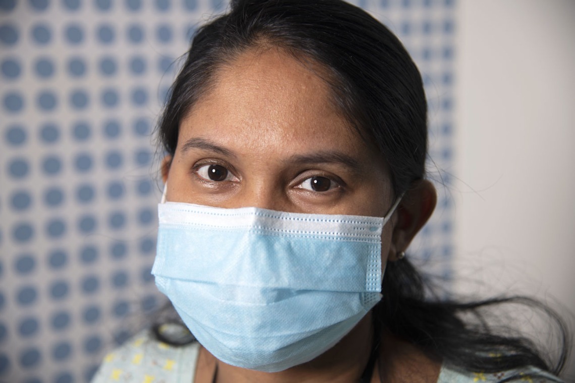 Photographed proudly wearing a mask, Dhanalakshmi Shankara Raman, postdoctoral research associate with the UArizona Center for Innovation in Brain Science poses for the UArizona Health Sciences “I Wear a Mask” campaign.