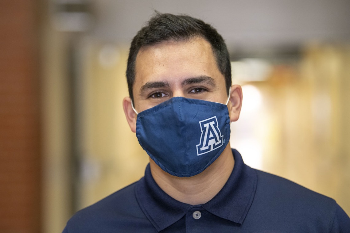 First-year College of Medicine – Tucson student Andres F. Diaz wears a mask for the immunocompromised, especially kids.