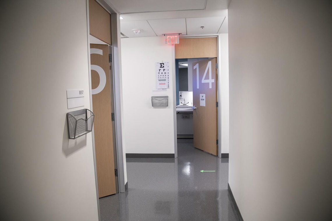 On the eighth floor, standardized patients help students learn patient care, with simulated exam rooms. 