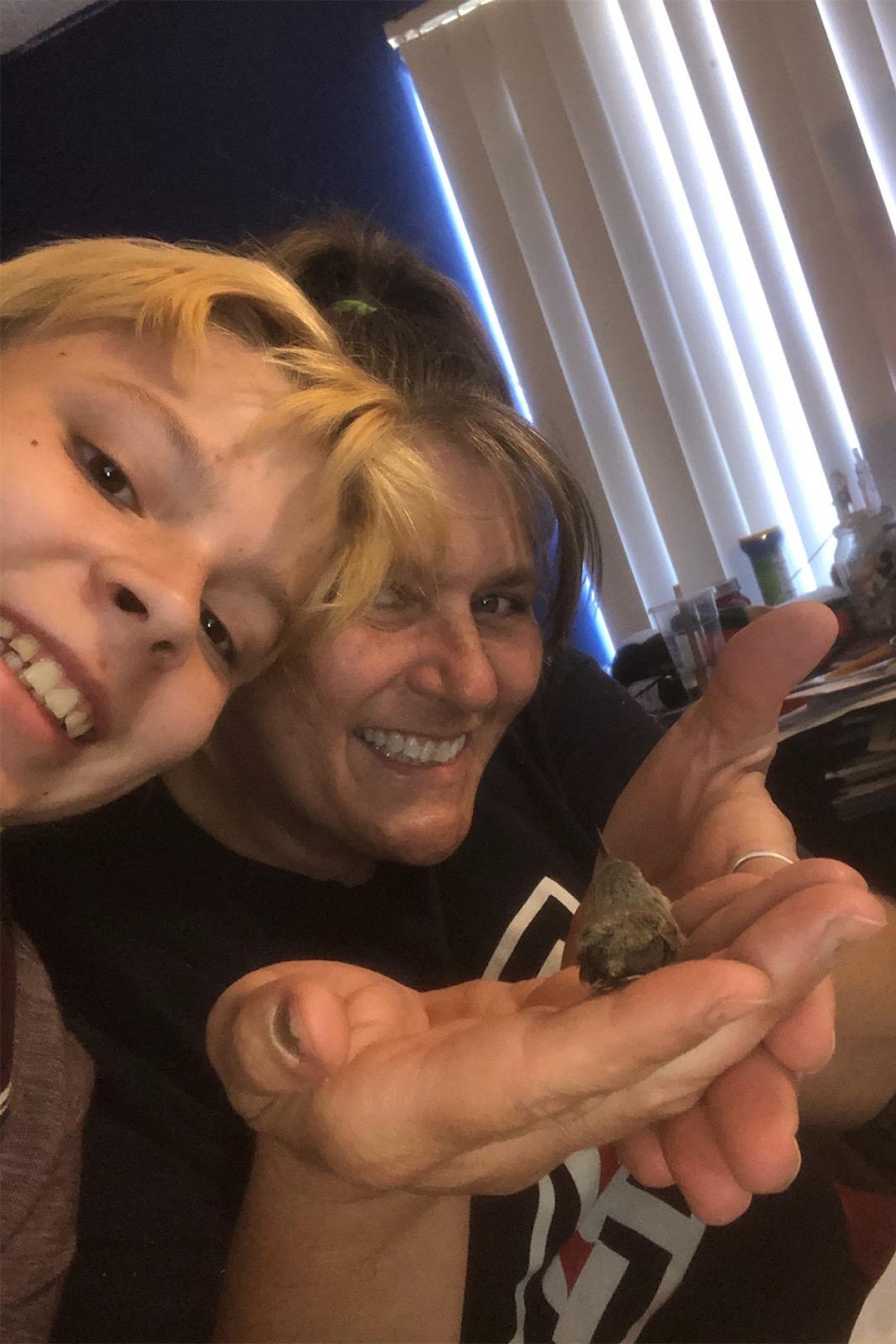Tammie Anderson and her grandson find a hummingbird while she’s on the clock as an administrative associate for the College of Medicine – Tucson for the Department of Medical Imaging.