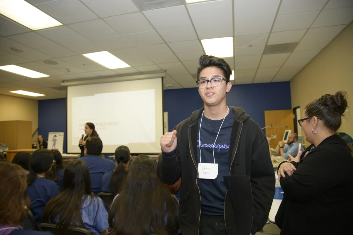 Christopher Ruiz from Sunnyside High School received a scholarship from Banner at the career fair.