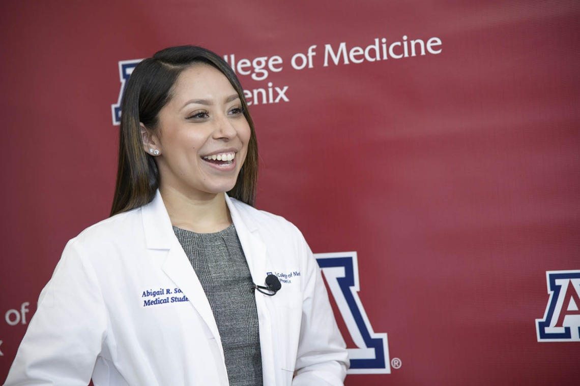  Primary Care Physician scholarship recipient Abigail Solorio smiles for a photo before the reception. 