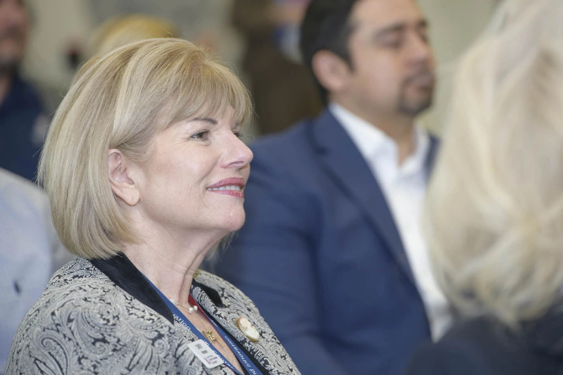 Cindy Anderson, University of Arizona College of Medicine - Phoenix director of operations for Center for Simulation and Innovation, listens to speakers.