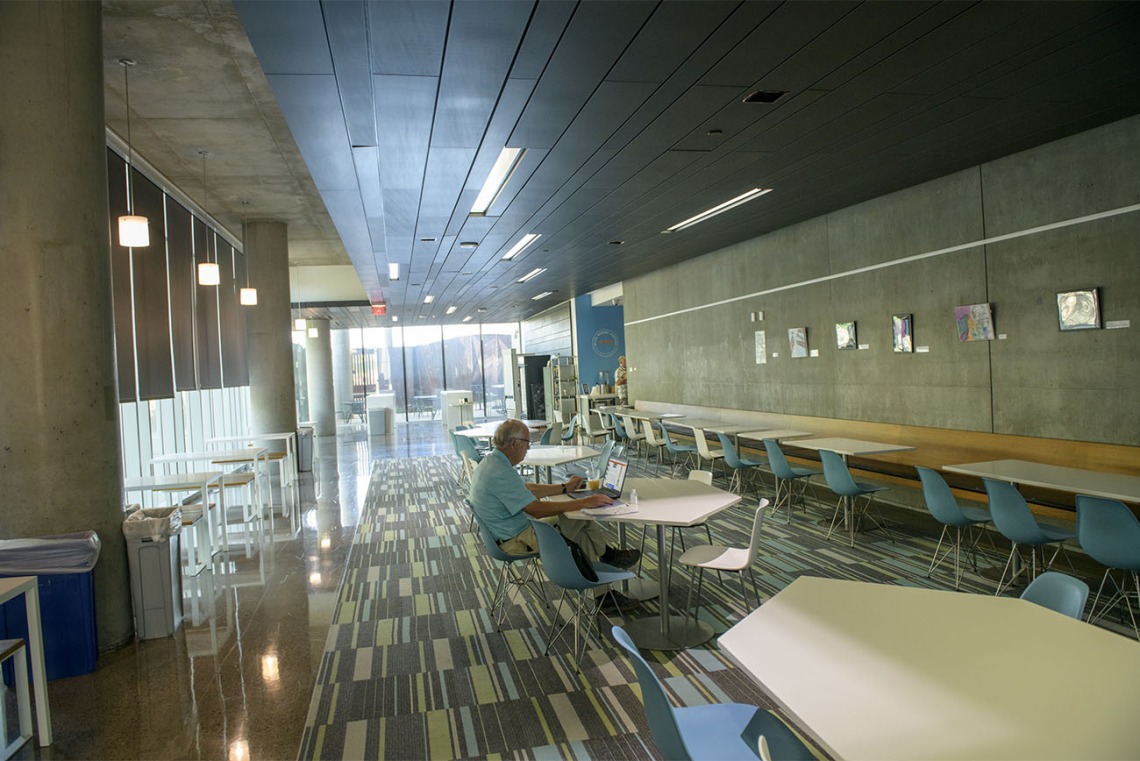 Whether eating alone or with friends, this second-floor dining area in the Health Sciences Education Building on the Phoenix Biomedical Campus offers art, modern décor and natural light. 