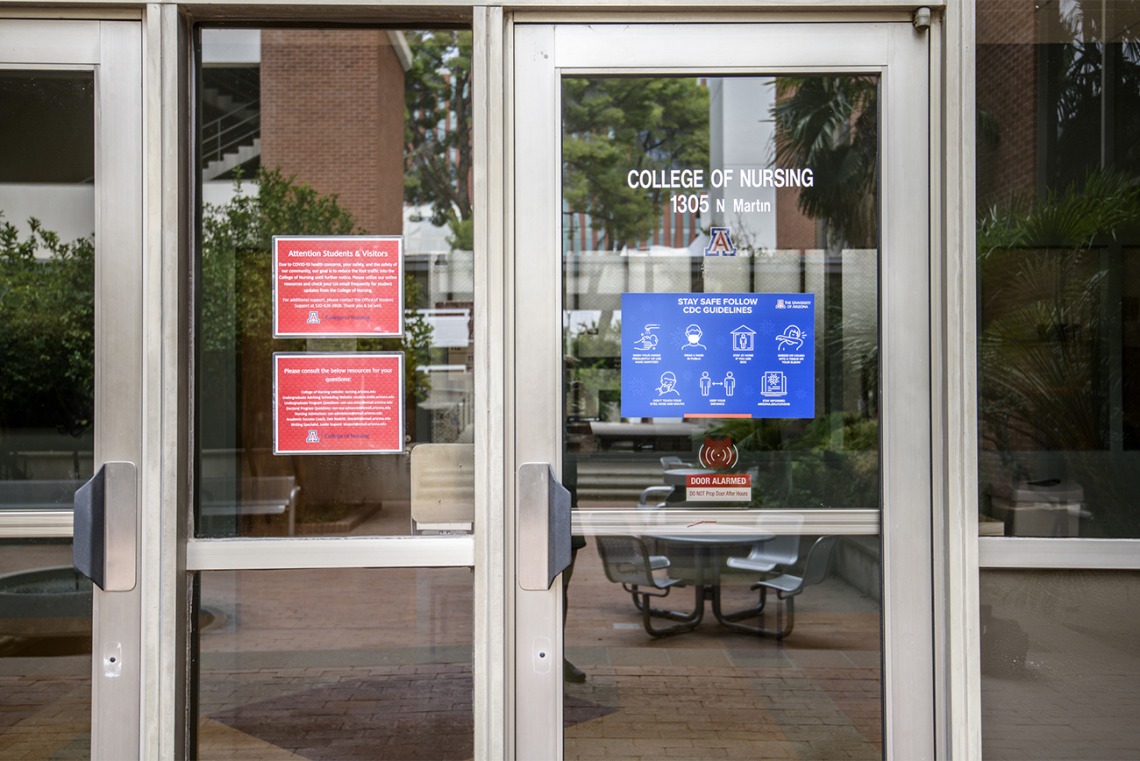 Across campus, signage reminds passersby to follow CDC safety guidelines for mitigating the transmission of diseases such as COVID-19.