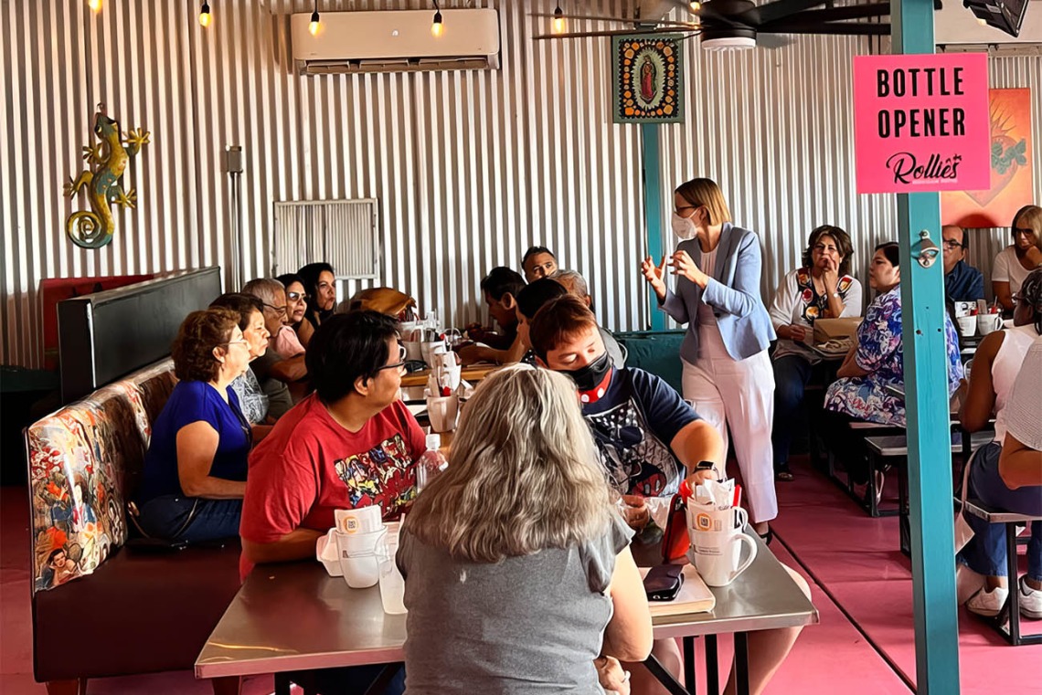 Joann Sweasy, PhD, director of the UArizona Cancer Center, speaks at a Scientific Café event at Rollies Mexican Patio restaurant.