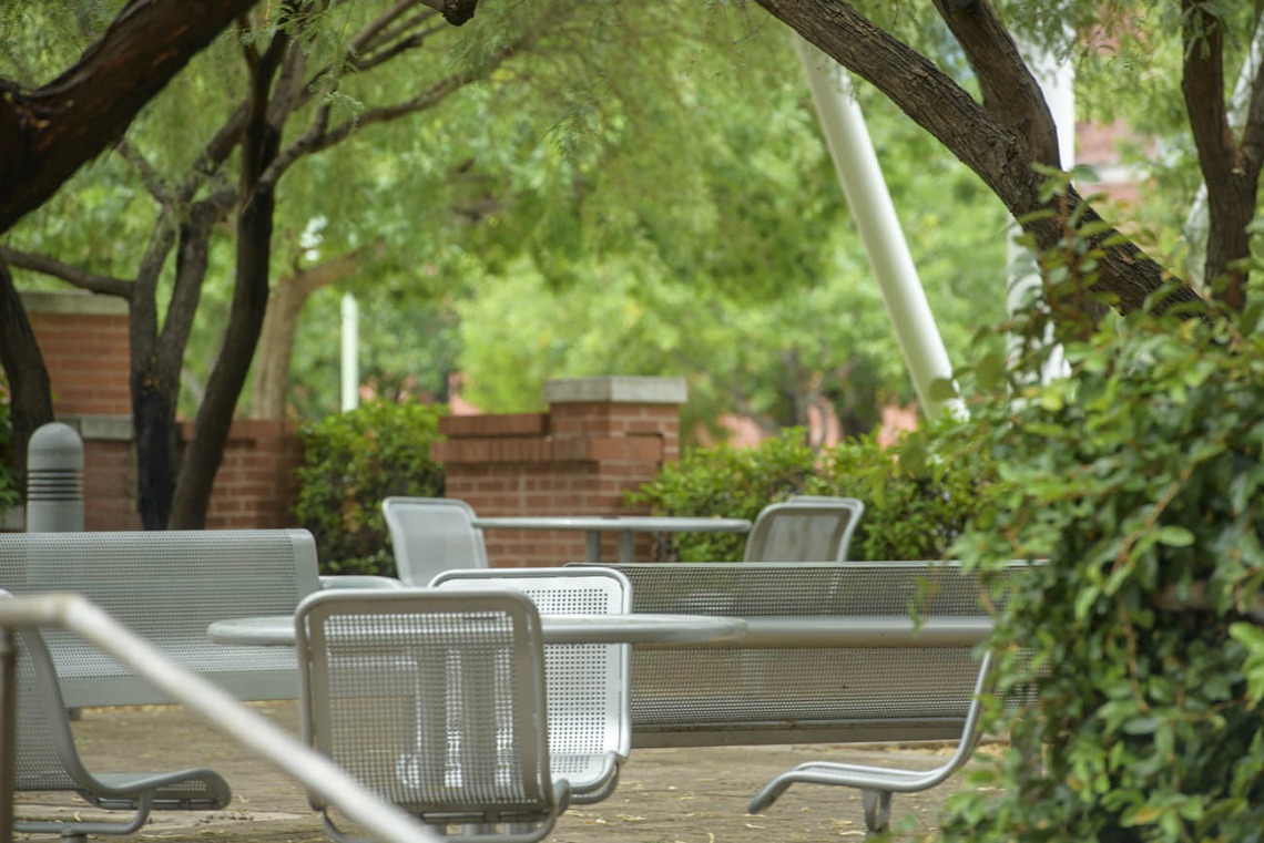 This beautiful tree-covered courtyard sits just east of BIO5 and south of Drachman Hall on the Tucson campus. It’s a favorite for outside lunches or meetings, with its tables, chairs and shade. 