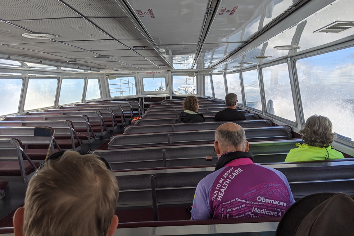 The riders took a ferry from Michigan mainland to Mackinac Island, where no motorized vehicles are permitted. The group practiced social distancing on the ferry.