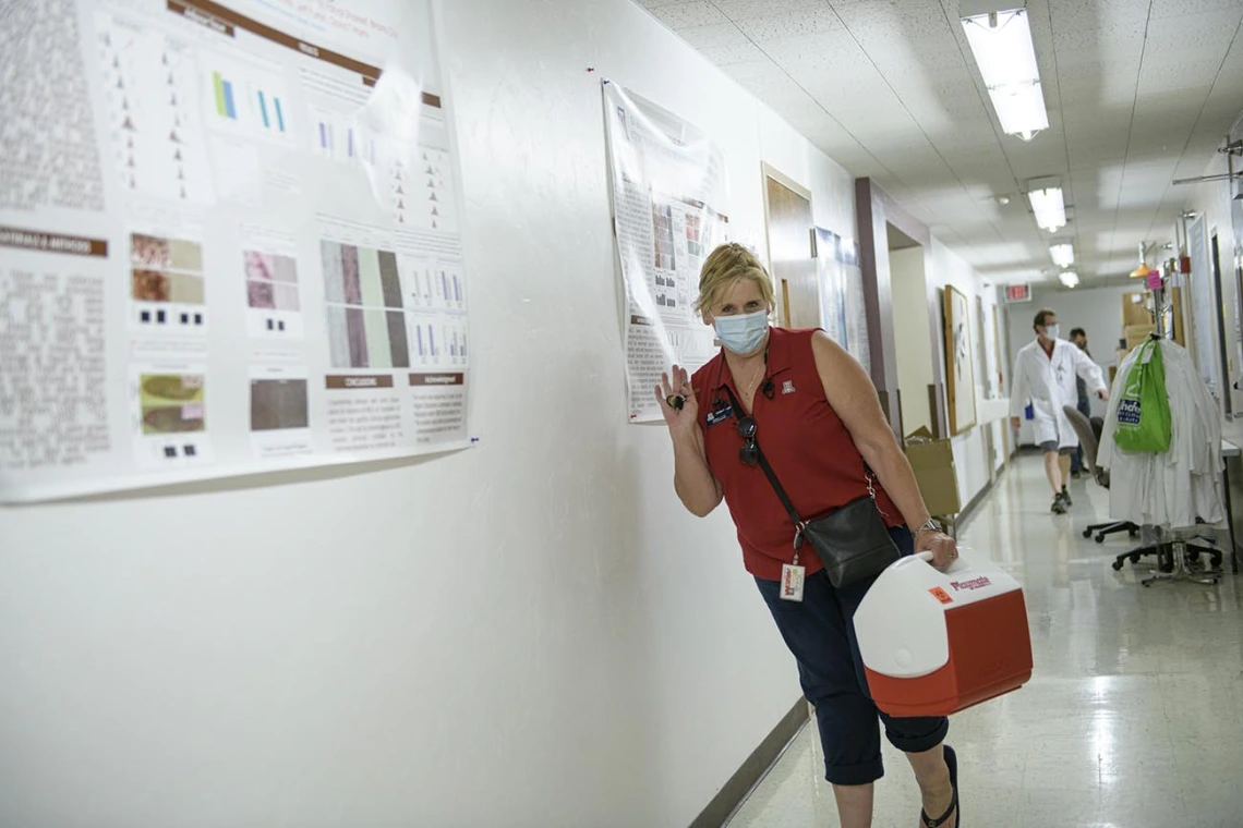 After the sample is collected, it is stored with other samples in a cooler to be taken to a lab at the University of Arizona Health Sciences. Students receive their results within two hours. 