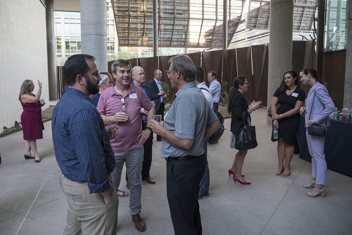 Attendees mingle after “Precision Health Care for All: The University of Arizona Health Sciences Center for Advanced Molecular and Immunological Therapies,” the first UArizona Health Sciences Tomorrow is Here Lecture Series presentation in Phoenix.