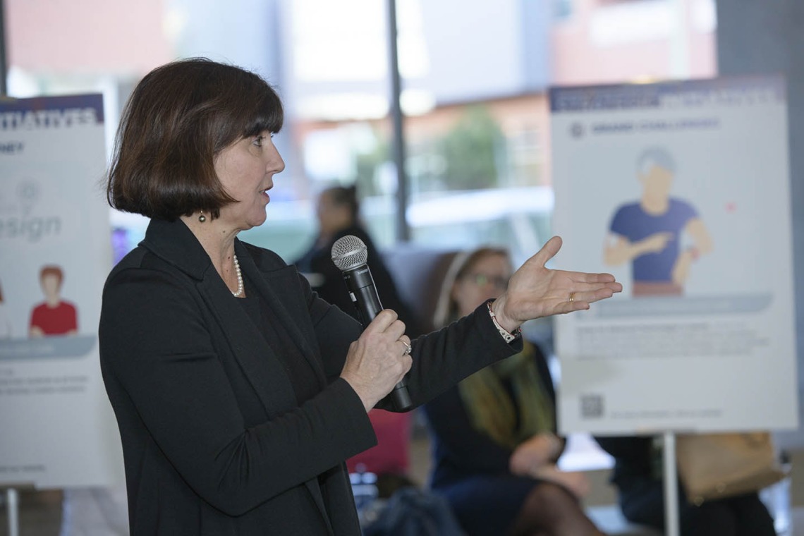 At the end of the town hall event, audience members had the opportunity to ask Dr. Dake questions about the Health Sciences strategic initiatives. Pictured here is Monica Kraft, MD, chair of the Department of Medicine.