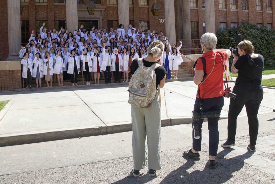 Photographers capture the moment for R. Ken Coit College of Pharmacy class of 2023 after their white coat ceremony.