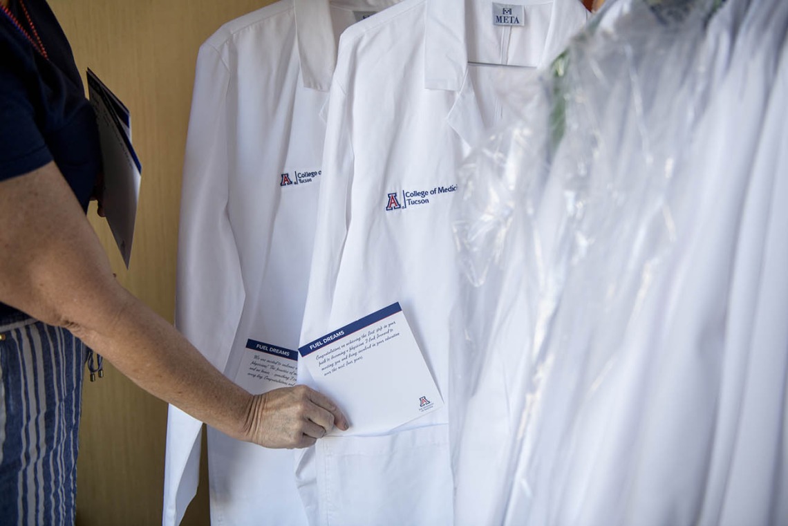 Each white coat presented has an inspirational note in the pocket written by faculty and staff.