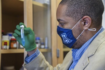 Dr. Michael Johnson investigates how copper interacts with bacteria, and considers mentorship one of the most important aspects of his scientific career.