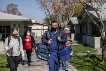 Staff and students from the University of Arizona Health Sciences delivered COVID-19 vaccines to residents of a senior public housing complex.