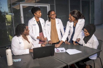 Quin Johnson, Shannon Alsobrooks, Amanda Musvosvi, Chikodi Ohaya and Fatouma Tall – leaders and members of the Student National Medical Association chapter – reactivated the chapter last year after it had been dormant several years. 