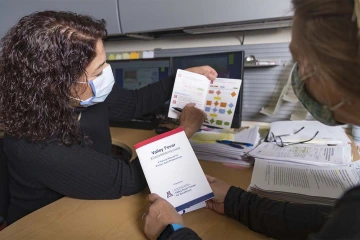 Outreach is one of the missions of the Valley Fever Center for Excellence. Here, Fariba Donovan, MD, PhD, educates a standardized patient about the fungal disease.