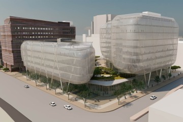 A rendering of the proposed Center for Advanced Molecular and Immunological Therapies building on the Phoenix Bioscience Core, looking at the Bioscience Partnership Building on the left. 