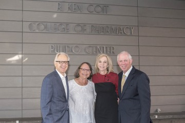 R. Ken Coit and his wife Donna Coit stand with UArizona President Dr. Robert C. Robbins and his fiancée Linda Gallander.
