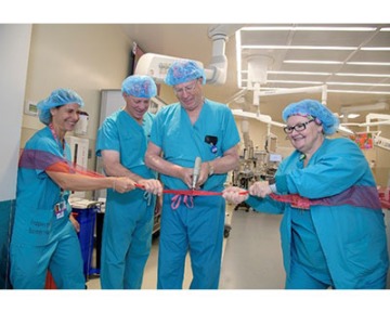 Drs. Taylor Riall, Robert Robbins, Irving Kron and Perioperative Services Director Kara Snyder, RN, PhD. Photo:  Rick Kopstein, UAHS BioCommunications.