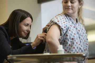 A dermatologist needs to examine your skin up close to make a proper diagnosis. Pictured here: Clara Curiel, MD, co-director of the Skin Cancer Institute.