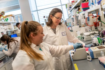 Taben Hale, PhD, (right) associate professor of basic medical sciences and director of Women in Medicine and Science at the College of Medicine – Phoenix, runs her own lab, something her grandmother could only dream of doing.