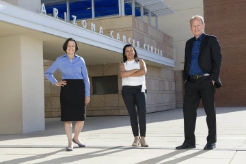 Rounds (center) with faculty mentors Dr Briehl (left) and Dr. Wondrak (right).