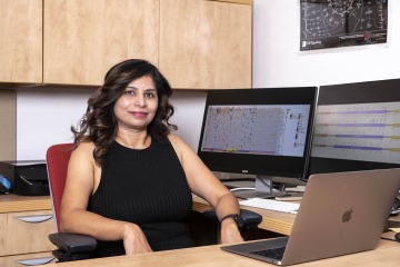 portrait of rita pandey in her office at the university of arizona cancer center