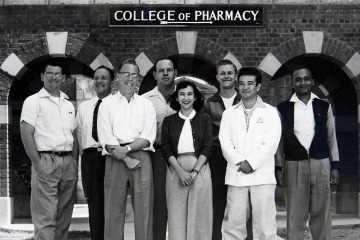 A black and white photo of the Class of 1955 from the UArizona College of Pharmacy.