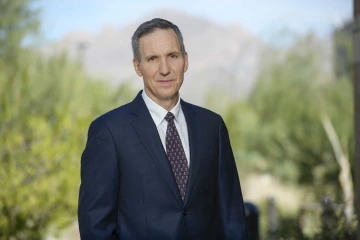 Portrait of University of Arizona Health Sciences researcher Jeff Burgess in a desert setting outdoors