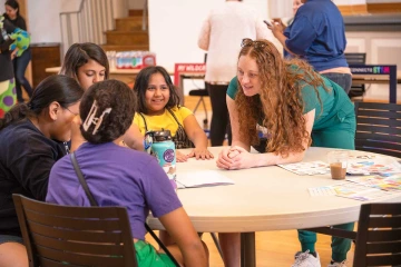 children and instructor at community event