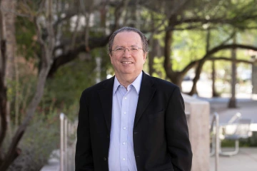 An outdoor portrait of Fernando Martinez, MD