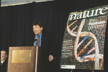 Eric Lander (Whitehead Institute) spoke at a 2003 press conference for the publications describing the initial analyses of the human genome sequence. (Courtesty of National Human Genome Research Institute)