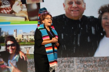Nancy Alvarez, PharmD, BCPS, wears a sash her parents fashioned from a serape, at her inaugural address as the American Pharmacists Association’s 162nd president. (Photo courtesy of Nancy Alvarez)