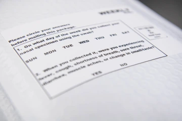 Study participants self-report any COVID-19 symptoms each week and return the information, along with the nasal swab, to researchers. 
