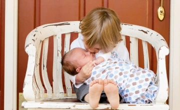 Young boy with baby