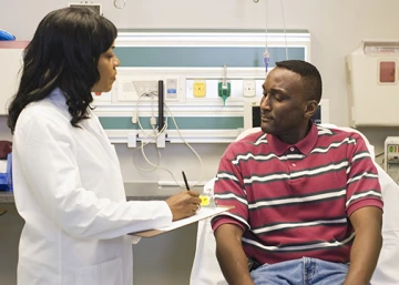 Doctor talking with patient