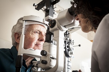 Older male getting an eye exam