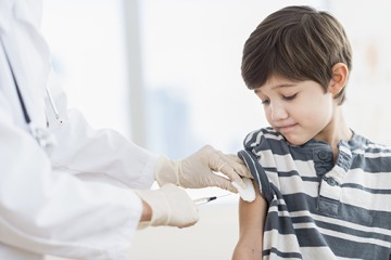Boy getting a vaccination