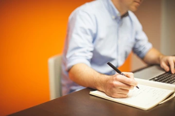 Man sitting at a desk working