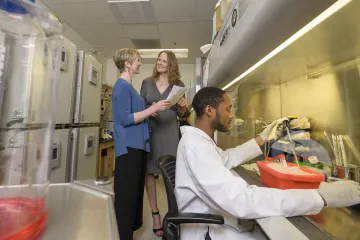 Dr. Goodrum and Dr. Ernst in a lab