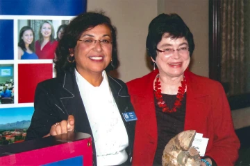 Dean Iman Hakim, MD, PhD, MPH, with founding Dean Emerita G. Marie Swanson, PhD, MPH, at the college’s 10th anniversary celebration.