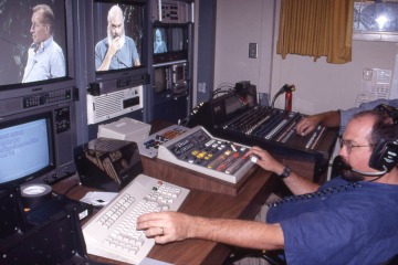Rick Collins, former BioCom medical television manager, recording a live studio interview with Dr. Andrew Weil in the 1990s. During that time, television broadcast over cable that was connected through Arizona Public Media.