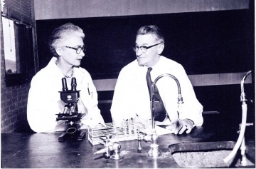 Dr. Caldwell sits in a lab with her husband, George Thornhill Caldwell, PhD, who was head of the department of zoology at UArizona. 