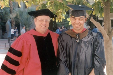 Mohab Ibrahim and Phil Malan in graduation regalia