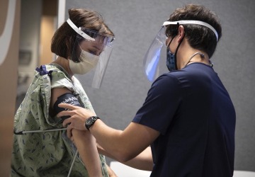 Medical students practice interacting with patients during their education.