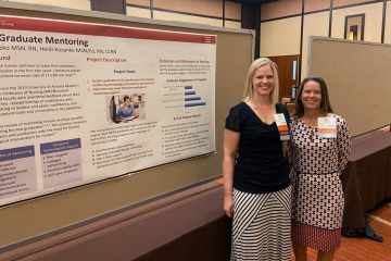 Heidi Kosanke, MSNEd, RN, CCRN (left), and Karin Blasko, RN, BSN, MSN, present their poster on graduate mentoring at the 2021 Arizona Nurses Association fall conference in Chandler, Arizona.