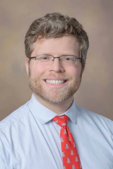 portrait of psychiatrist and sleep researcher Andrew Tubbs, MD, PhD
