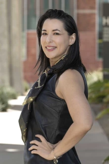 Portrait of Celina Valencia, DrPH, standing outside