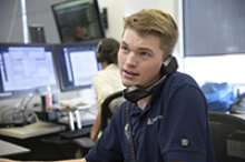 Briggs Carhart, a master’s degree student in public health, helps the Arizona Poison and Drug Information Center field the hundreds of daily calls they receive from people worried about the COVID-19 pandemic.